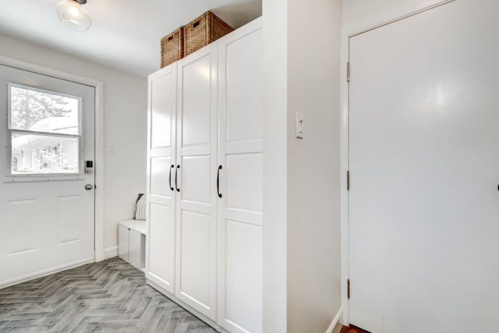 mudroom with tile flooring